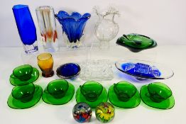 A collection of various art glass pieces to include paperweights, vases and similar,