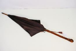 An S Fox & Co Paragon parasol.