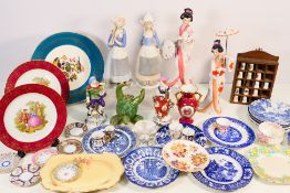 A mixed lot of ceramics to include blue and white, continental figures,