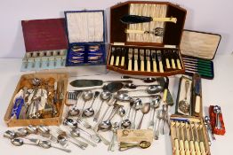 A collection of mixed flatware, plated and stainless, part cased / boxed.