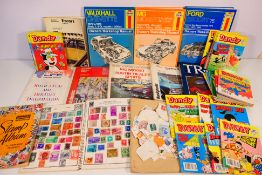 Lot to include motor maintenance handbooks, Dandy Comic Libraries and a small quantity of stamps.