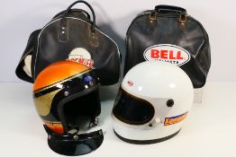 Two vintage motorcycle helmets comprising a Premier open face helmet and a Bell helmet with