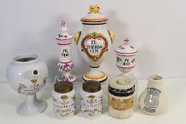 A collection of apothecary jars to include theriac,