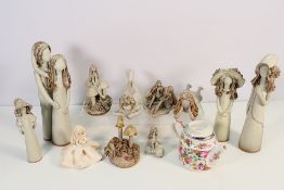 A collection of pottery figures and fungus models,