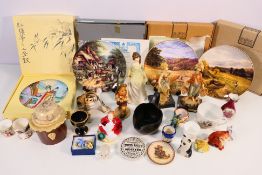A mixed lot of ceramics and similar to include boxed cabinet plates, a Lomonosov tiger cub figure,