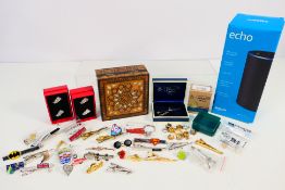 A boxed Amazon Echo smart speaker (2nd Generation) and a quantity of costume jewellery.