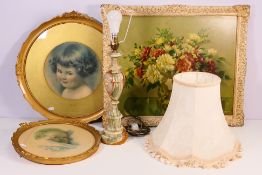 An onyx table lamp and three framed prints including a floral still life,