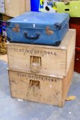 Two wooden storage crates with rope handles,
