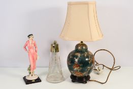 Lot to include a decorative table lamp,
