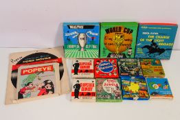 A collection of boxed 8mm cine films to