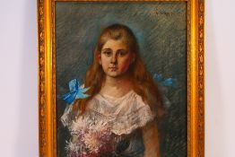 A glazed and framed portrait, signed by