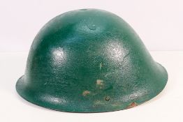 A British Army Mk4 combat helmet with li