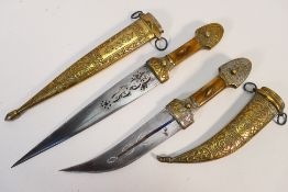 Two North African daggers with brass sca