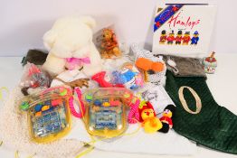 Lot to include toy telephones, soft toys