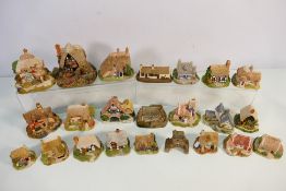 A collection of unboxed Lilliput Lane an