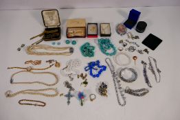 A collection of costume jewellery to include rings, necklaces, ear clips, pendants and other,