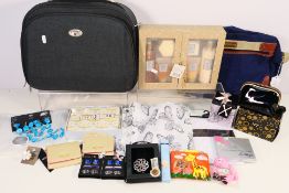 A mixed lot to include an Antler bag, tw