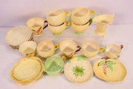 A collection of Carlton Ware cups, saucers and similar.