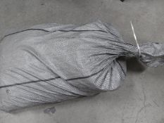 A sealed sack containing approximately 26 kg of unexamined pre-owned assorted costume jewellery and