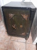 A vintage Bent Steel Fire & Thief Resisting Safe marked for Withy Grove Stores,