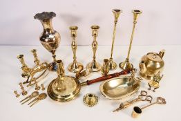 A collection of brassware to include candlesticks, vases and other,