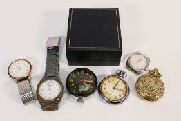 A collection of wristwatches and pocket
