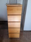 A five drawer filing cabinet measuring approximately 124 cm x 40 cm x 48 cm.