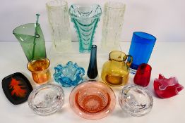 A collection of decorative art glass vas