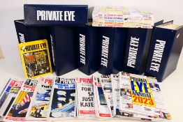 A large quantity of Private Eye magazine housed over seven binders with some loose and a small