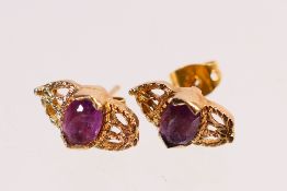 A pair of 9ct gold, stone set ear studs,
