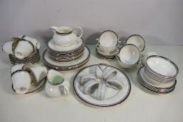 A quantity of Royal Doulton Sarabande pattern dinner and tea wares, approximately 58 pieces,