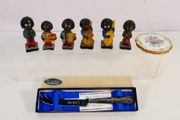 Six Robertson's advertising figures, all