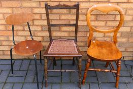 Three various chairs. [3].