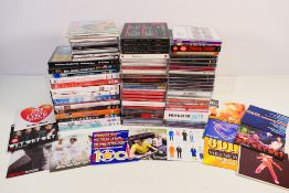 A collection of various compact discs an