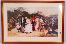 A framed print, The Village Wedding, mou