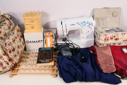 A Brother LK14s sewing machine with accessories, a Tog 24 lady's jacket,curtains and other. [2].