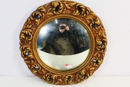 A Georgian style wall mirror with convex