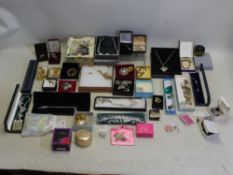 A collection of costume jewellery, predominantly boxed to include brooches, necklaces,