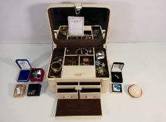 A Jasper Conran jewellery box containing a quantity of costume jewellery to include necklaces,
