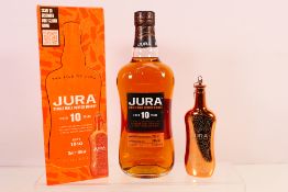 A 70cl bottle of Jura 10 Year Old Single Malt Scotch Whisky and keyring flask gift set,
