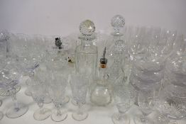A collection of good quality glassware to include decanters, table lamp,