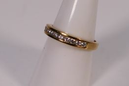 A 9ct yellow gold stone set ring, size O+½, approximately 2.8 grams.
