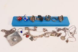 Lot to include a white metal charm bracelet with silver heart shaped padlock clasp witha quantity