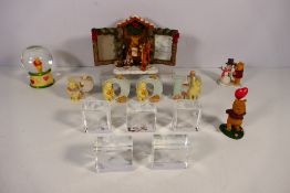 Disney - A collection of Winnie The Pooh related items / figures to include snow globe,