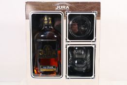 A Jura Origin gift set comprising a 70cl bottle of Jura Origin 10 Year old Single Malt Scotch