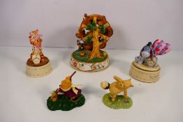 Disney - Five Winnie The Pooh ornaments to include a Hunny Of A Day Musical Ferris Wheel,