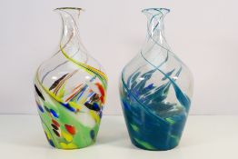 Two large Murano style glass vases with swirl decoration, one in tones of blue and green,