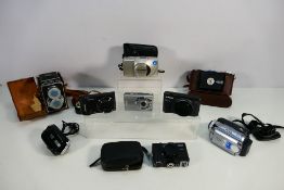 Photography - A collection of cameras to include an Olympus Mju Zoom 140, Sony, Canon,