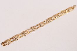 A 9ct gold openwork bracelet, 9 cm (l), approximately 5 grams.