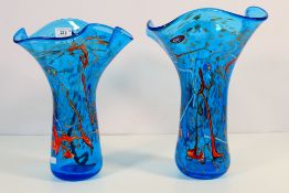 A pair of Italian glass vases with shaped rims and aventurine inclusions and polychrome trails to a